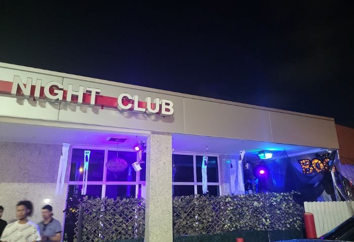 Club Boi, gay night club. Building facade with Night Club sign, decorated for Halloween. Gay travel advice.