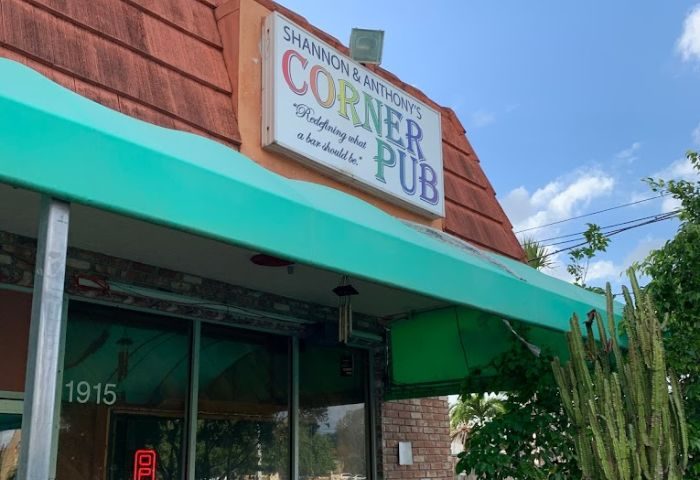 Shannon & Anthony's Corner Pub, a gay-friendly bar. The sign says Redefining what a bar should be. A popular spot for gay men travelers.