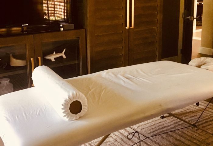 Massage by Erik: Massage table with white linens and bolster. Gay men's travel relaxation and spa services. 2-21.jpg.