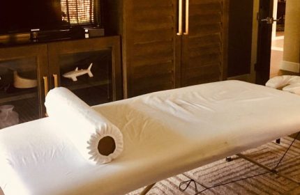 Massage by Erik: Massage table with white linens and bolster. Gay men's travel relaxation and spa services. 2-21.jpg.