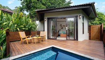 SAii Koh Samui villa with private pool. Deck with chairs, table, and pool access. Tropical getaway for gay men. 250418-Saii-Samui-0002.jpg