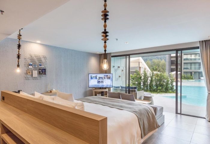 La Vela Khao Lak resort room. King bed, pool access, modern decor. Ideal for gay men travel. 259190816.jpg. Thailand vacation.