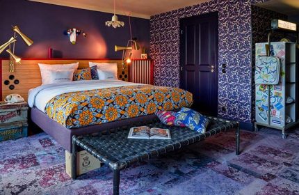 25hours Hotel Terminus Nord Paris room. Gay-friendly hotel with colorful, eclectic decor. Unique design elements, ideal for gay men travel.