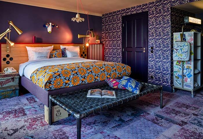 25hours Hotel Terminus Nord Paris room. Gay-friendly hotel with colorful, eclectic decor. Unique design elements, ideal for gay men travel.