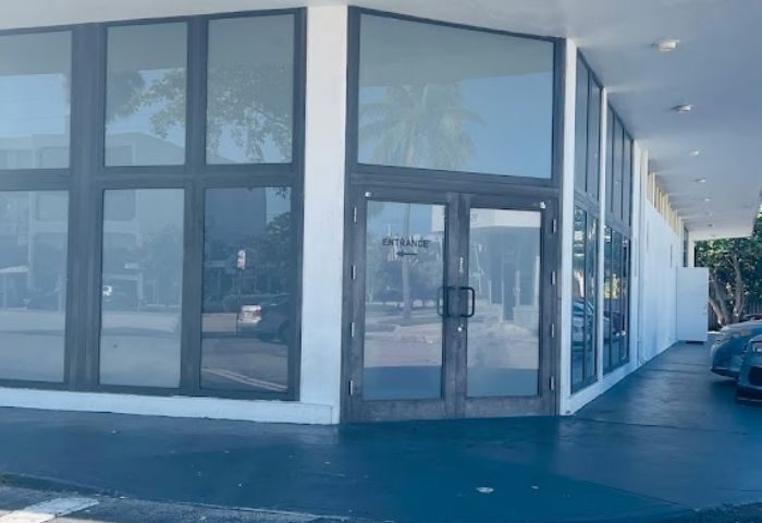 The Clubhouse II entrance. Glass facade of gay bar/club with Entrance sign on the door. Gay travel advice. 3-14.jpg