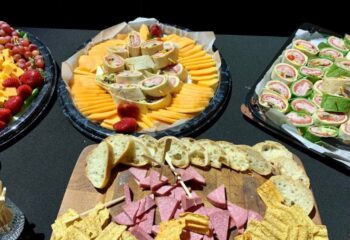 Hunters Wilton Manors catering: platters of wraps, cheese, fruit, bread, salami, and chips. Perfect for a gay travel event, party, or gathering.
