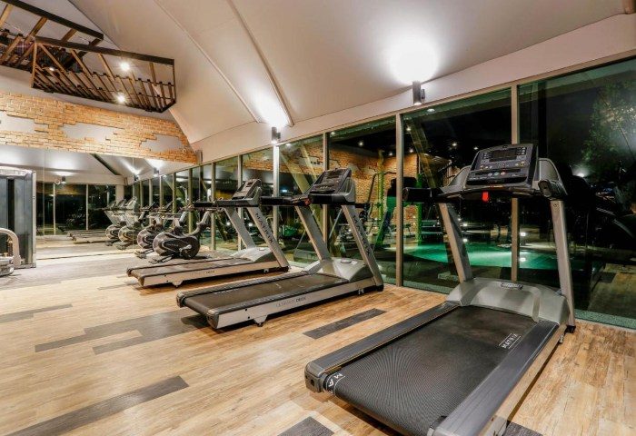 Kalima Resort Khao Lak gym with treadmills, weights, and exercise bikes. Modern fitness center for gay travelers in Thailand. 317059829.jpg