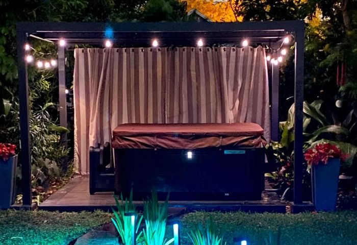 MuscleTech Bodywork Massage: Hot tub, curtains, & string lights create a relaxing spa atmosphere. Felix LMT offers massage for gay men. 4-19.jpg