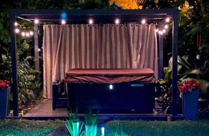 MuscleTech Bodywork Massage: Hot tub, curtains, & string lights create a relaxing spa atmosphere. Felix LMT offers massage for gay men. 4-19.jpg
