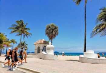 Infinity Lounge: Gay men on Fort Lauderdale Beach, Florida. Palm trees, blue sky, and ocean view. Travel advice for LGBTQ+ tourists.