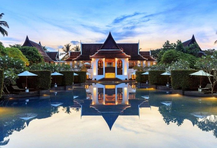 JW Marriott Khao Lak Resort & Spa pool view. Thai architecture reflected in pool. Gay travel in Thailand. 426581536 resort image.