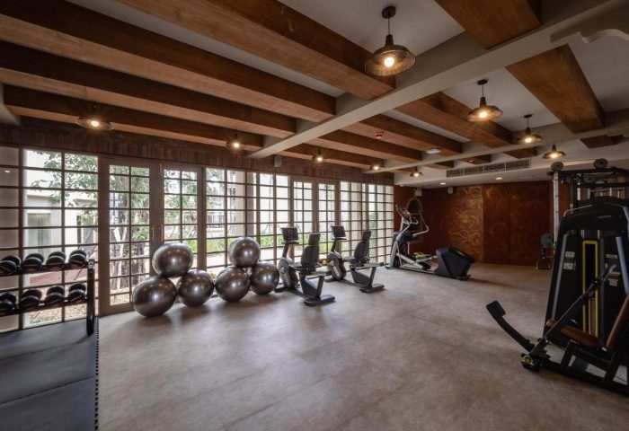 Devasom Khao Lak Beach Resort gym. Fitness equipment, weights, and exercise balls. A great place to stay for gay men's travel advice.
