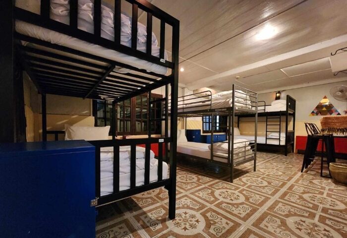 Club One Seven Gay Men Hotel dorm room. Bunk beds, lockers, tiled floor. Budget-friendly gay travel lodging. 517032662.jpg