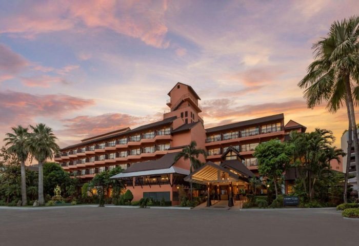 Courtyard Phuket, Patong Beach Resort exterior at sunset. Tropical gay travel destination with palm trees and modern architecture. 643394792.jpg
