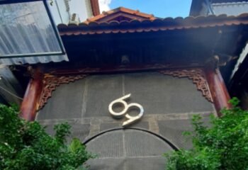 69 Sauna Ho Chi Minh: Facade of gay sauna in Vietnam, featuring traditional architecture and the number 69 as its logo. Travel advice.