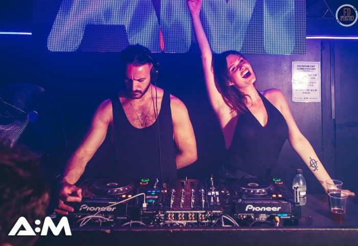 A:M Afterhours at Protocol, top London gay after-party. DJs at work, woman dancing at the best gay afterhours club in London, UK.