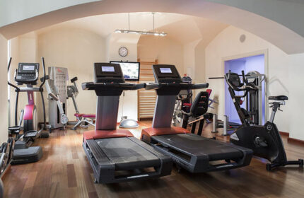Gym at NH Collection Carlo IV, Prague. This luxury hotel offers fitness facilities for gay travelers in Prague Old Town. Affordable stay!