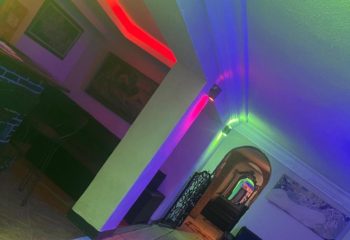 Aquarius Sauna Istanbul interior. Colorful lighting design in a hallway. Gay sauna travel advice. Istanbul's gay scene.