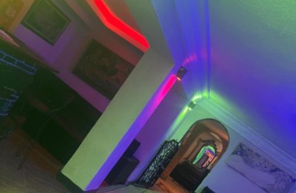 Aquarius Sauna Istanbul interior. Colorful lighting design in a hallway. Gay sauna travel advice. Istanbul's gay scene.