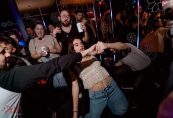 Arena Xperience Gay Club, Barcelona: Crowded dance floor with gay men and women dancing, drinking, and having fun at a gay party in Barcelona.