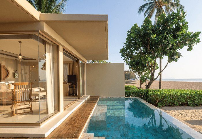 Devasom Khao Lak Beach Resort & Villas view. Artboard-21-1: Poolside villa with beach access. Luxury gay-friendly Thailand travel.