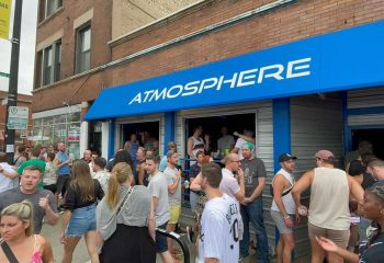 Atmosphere Andersonville gay bar in Chicago. People gather outside the live music venue. A popular spot for gay men and LGBTQ+ travelers.
