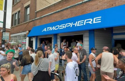 Atmosphere Andersonville gay bar in Chicago. People gather outside the live music venue. A popular spot for gay men and LGBTQ+ travelers.