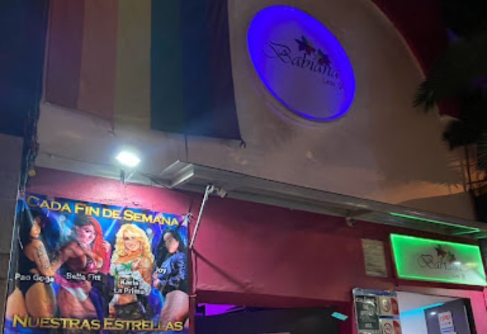 Babiana's gay bar in Mexico. Rainbow flag above the entrance. Poster with performers: Pao Goga, Bella Fitt, Karla La Prima, Joy.