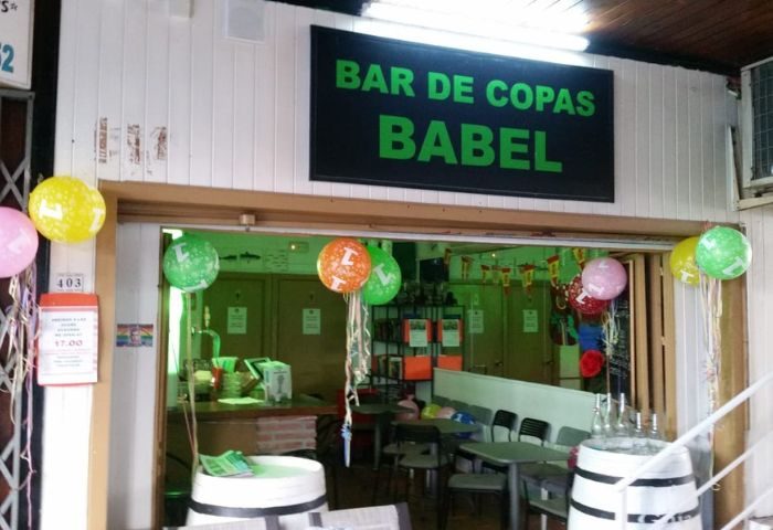 Gay Bar Babel in Torremolinos, Spain. The entrance is decorated with colorful balloons. A popular spot for gay men's travel.
