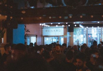 Crowded scene at Bar Renard in Montreal. Gay bar with many patrons, part of Montreal's gay nightlife scene. Gay travel advice.