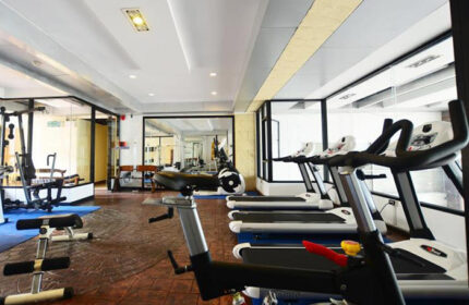 Baywalk Residence Pattaya gym. Gay-friendly hotel with cheap price. Fitness center with treadmills and exercise equipment. Rooftop pool hotel.