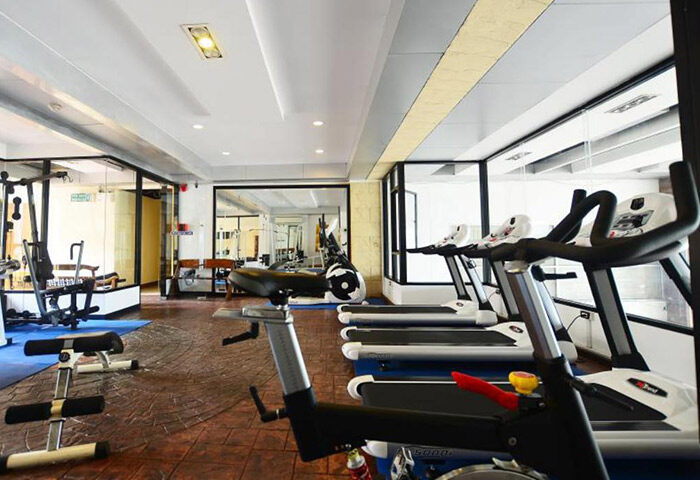 Baywalk Residence Pattaya gym. Gay-friendly hotel with cheap price. Fitness center with treadmills and exercise equipment. Rooftop pool hotel.