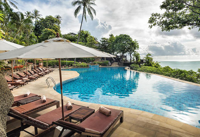 Panviman Resort Koh Phangan pool villa view. Luxury gay hotels in Koh Phangan offer stunning infinity pools and relaxing sun loungers.