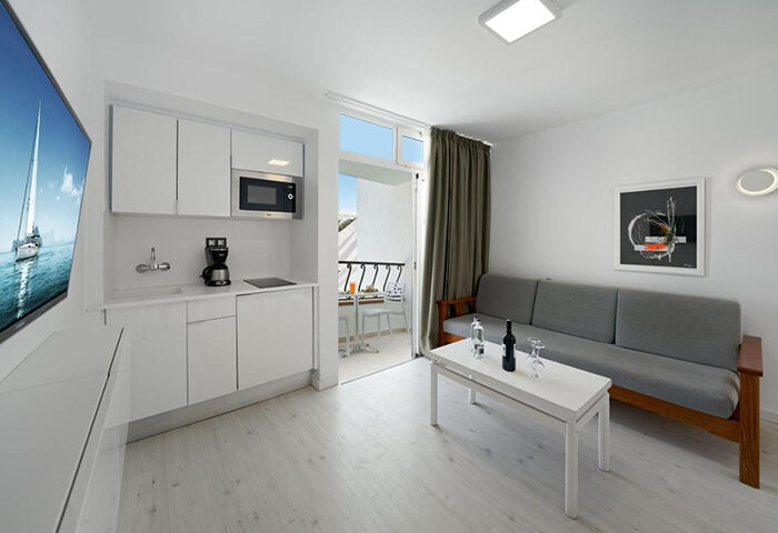 Atlantic Sun Beach gay men only hotel room. Budget Gran Canaria hotel with pool near gay nightlife. Modern studio apartment interior.