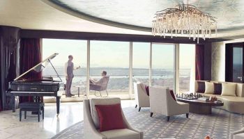 Raffles Istanbul Hotel suite. Luxury gay-friendly hotel with piano, balcony view, and impeccable service. Perfect for gay travel in Istanbul.