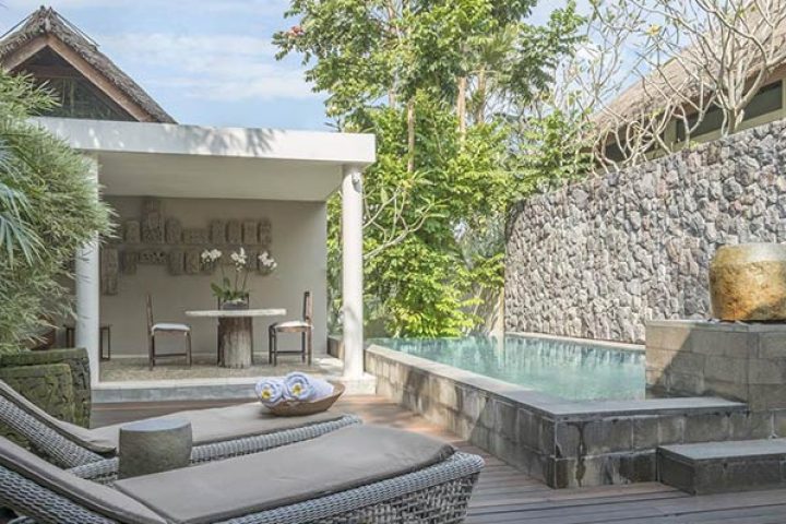 The Purist Villas & Spa, Ubud. Best gay-friendly resort in Bali. Poolside lounge chairs and private pool at this luxury gay travel destination.