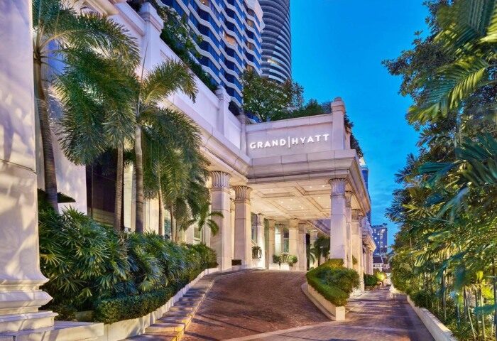 Grand Hyatt Erawan Bangkok entrance. A top Bangkok hotel for a gay honeymoon or vacation. Lush landscaping and elegant architecture.