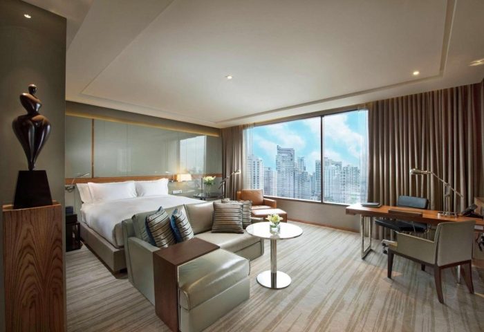 Hilton Sukhumvit Bangkok room. Best gay honeymoon hotels in Bangkok. Modern suite with city view. Ideal for LGBTQ+ travel and romantic getaways.