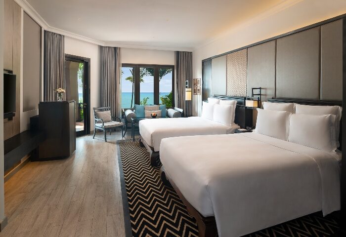 InterContinental Pattaya Resort room with two beds. Gay-friendly hotel deals in Pattaya Beach. Ocean view from room's balcony.