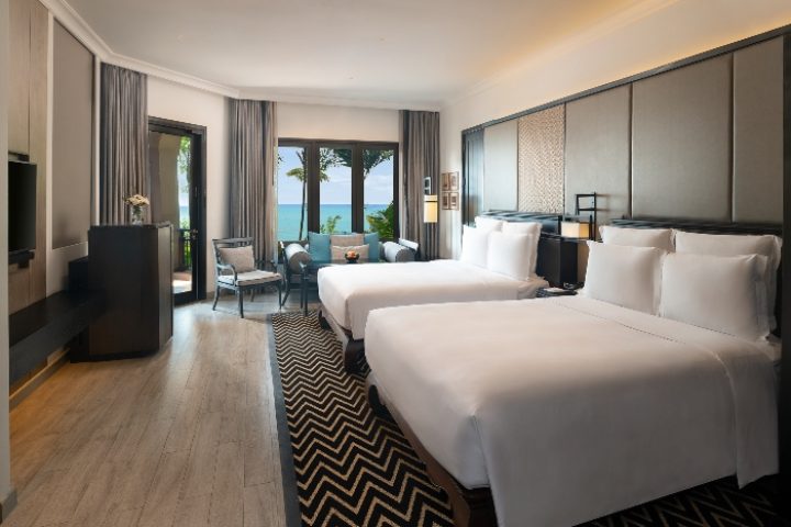 InterContinental Pattaya Resort room with two beds. Gay-friendly hotel deals in Pattaya Beach. Ocean view from room's balcony.