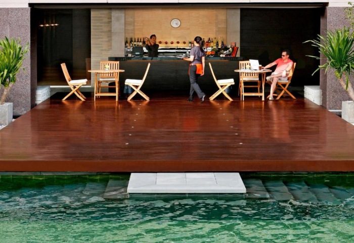 Sathorn Vista Bangkok Marriott Executive Apartments outdoor bar. Gay-friendly hotel with pool access for groups of friends in Bangkok.