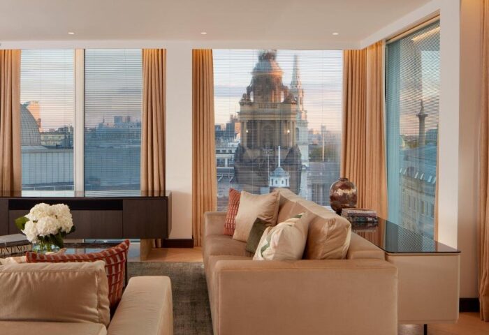 St Martins Lane Hotel, a best gay hotel in London's Covent Garden. City centre view from a stylish room. Modern design, comfortable seating.