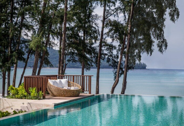 InterContinental Phuket Resort rooftop pool view. Best gay hotels Phuket. IHG Hotel pool, ocean view, and lounge chair. Gay travel advice.
