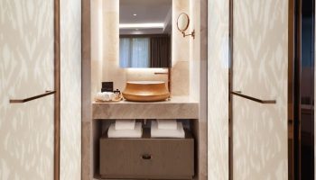 Burdock Hotel Istanbul bathroom. Stylish sink, mirror, and vanity. Gay-friendly hotel for gay travelers in Istanbul. Autograph Collection.