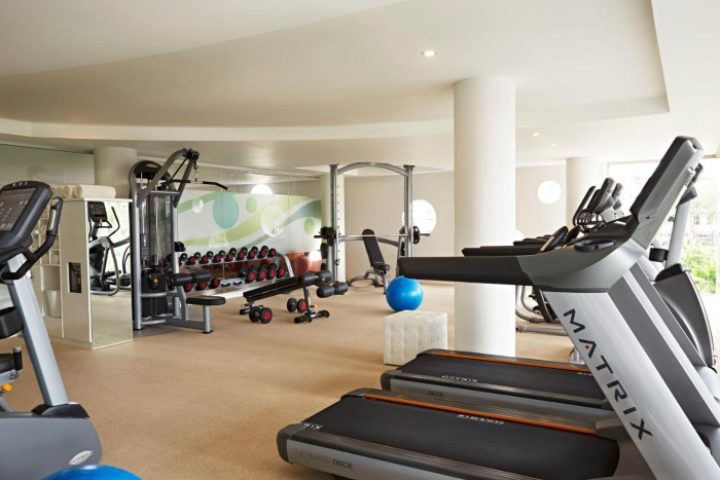 Double-Six Luxury Hotel Seminyak's gym in Bali. Best gay wellness hotel with treadmills, weights, and fitness equipment for a healthy stay.
