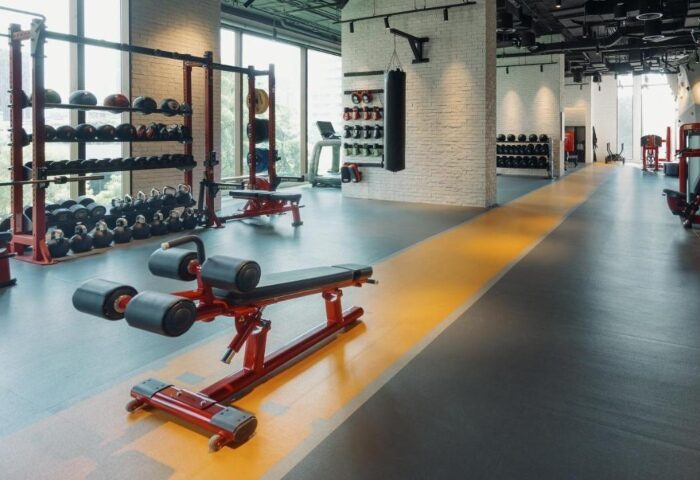 Kimpton Maa-Lai Bangkok gym. Wellness hotel in Silom, Bangkok. Fitness center with weights, punching bag, and modern equipment.