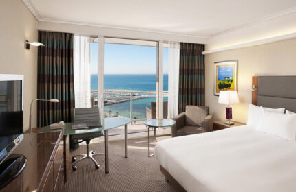Hilton Tel Aviv room with Hilton Beach view, perfect honeymoon hotel for gay men. Balcony overlooking the gayborhood.