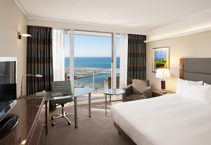 Hilton Tel Aviv room with Hilton Beach view, perfect honeymoon hotel for gay men. Balcony overlooking the gayborhood.