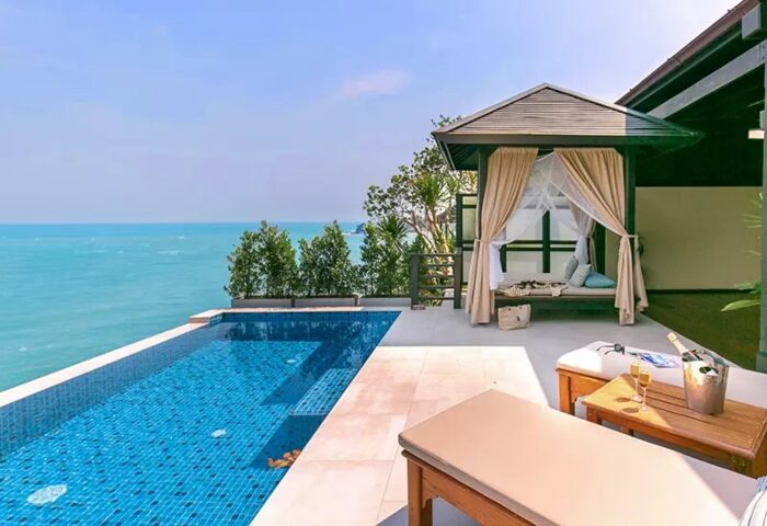 Garrya Tongsai Bay Samui gay hotel infinity pool. Rooftop luxury with ocean view, daybeds, and champagne. Best Koh Samui travel.