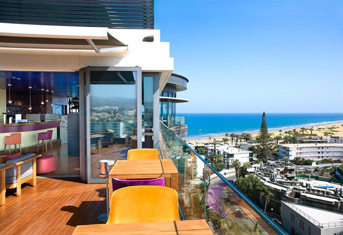 Bohemia Suites & Spa, adults-only luxury gay hotel in Playa del Ingles, Gran Canaria. Ocean view from the hotel's stylish terrace.